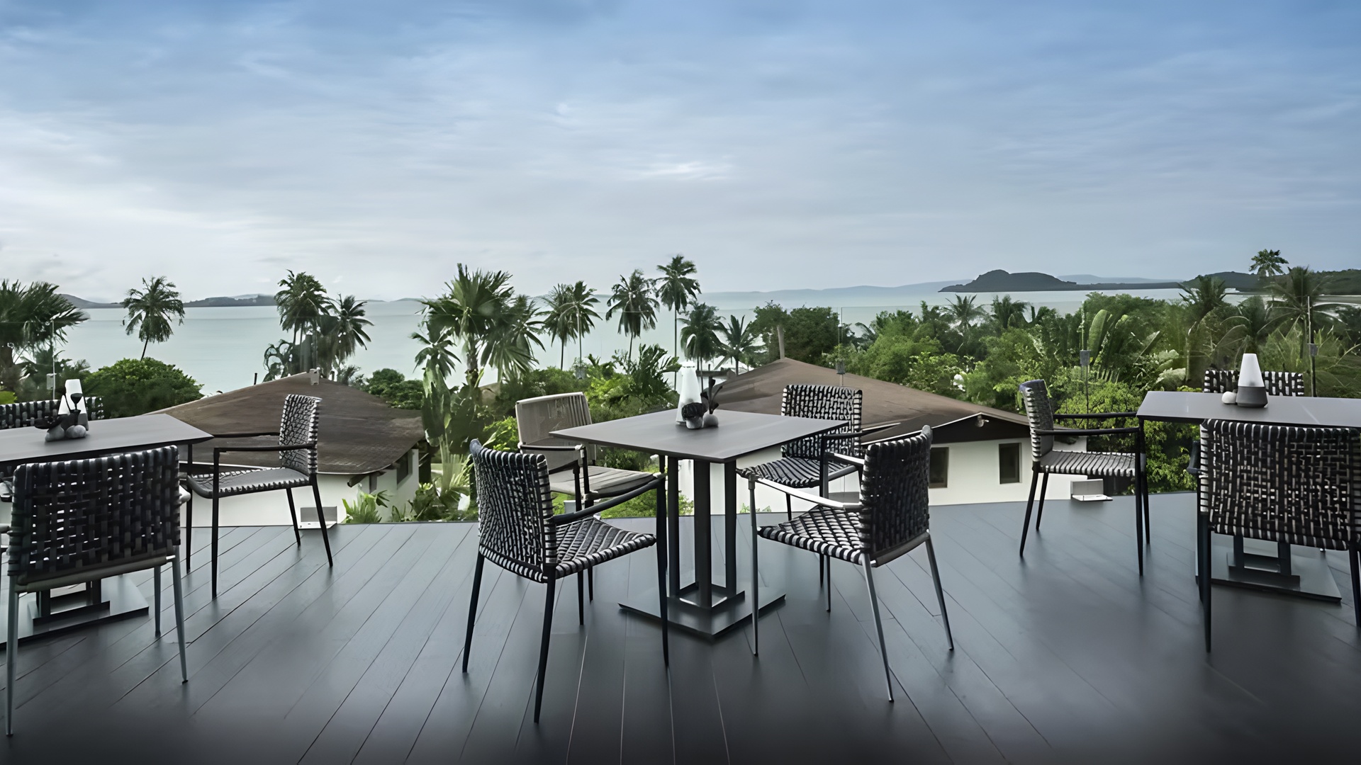 an outdoor dining area at the Barceló Coconut Island resort in Phuket, Thailand
